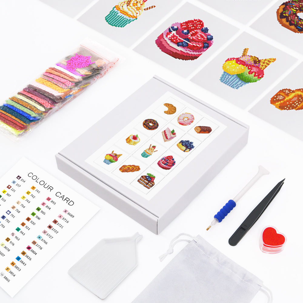 Mini Kunst embroidery kit with colorful threads, tool set, color card, and dessert designs for creative crafting.