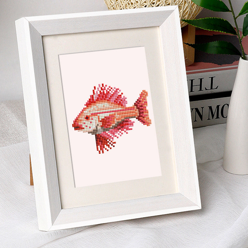 Framed mini diamond painting of a colorful fish, part of the Meeresbewohner 12er SET - Diamond Painting collection.