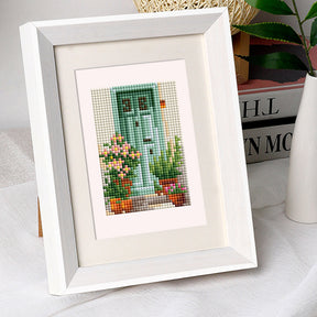 Framed Diamond Painting of a Green Door and Blossom Pots - Mini Kunst Artwork