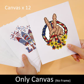 Hands holding a 12-piece USA Edition Diamond Painting set featuring mini kunst designs on canvas.